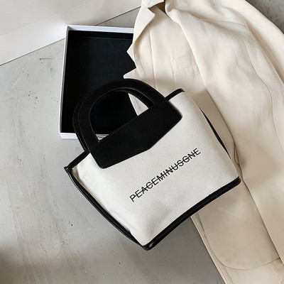 Casual γυναικεία τσάντα με μακριά λαβή και επιγραφή