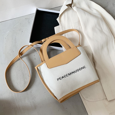 Casual γυναικεία τσάντα με μακριά λαβή και επιγραφή