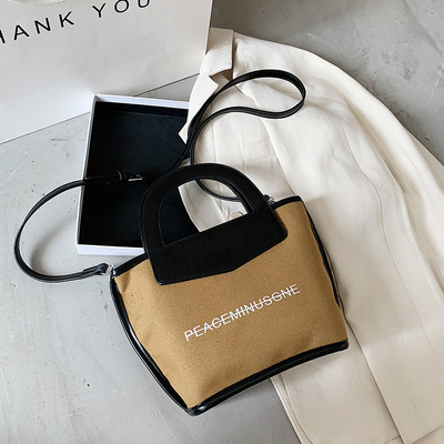 Casual γυναικεία τσάντα με μακριά λαβή και επιγραφή