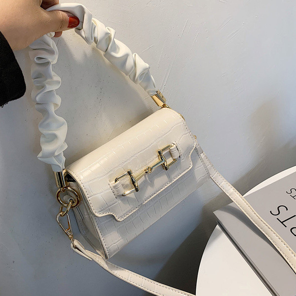 Stílusos női kis táska eco bőrből, csattal