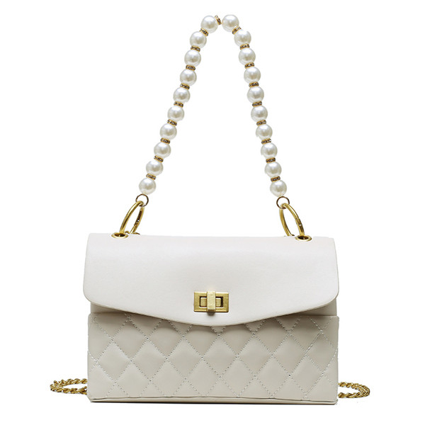 Κομψή γυναικεία τσάντα από οικολογικό δέρμα με διακοσμητικές πέρλες