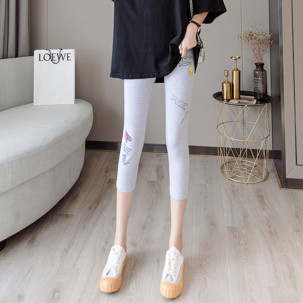 Ženske sportske tajice dužine 7/8 s aplikacijama