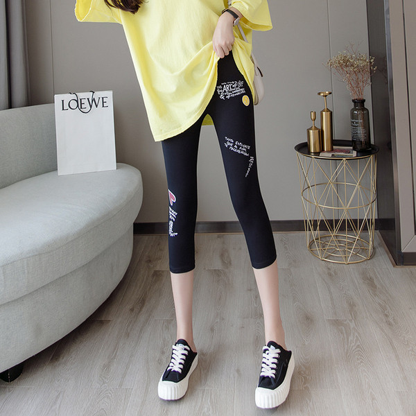 Ženske sportske tajice dužine 7/8 s aplikacijama