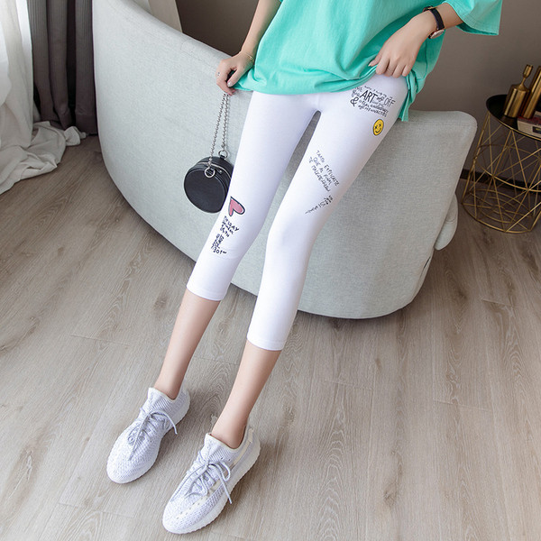 Ženske sportske tajice dužine 7/8 s aplikacijama