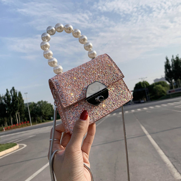 Moteriška moderni mini rankinė su sagtimi ir perlais