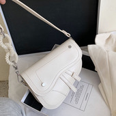 Moderni moteriška rankinė iš eko odos su dekoratyviniais perlais