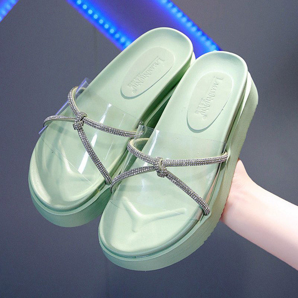 Model nou de papuci de damă cu talpă plată și curea din silicon