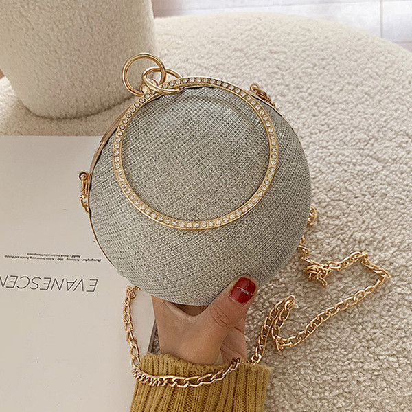 Geantă rotundă de damă cu mâner lung și închizătoare