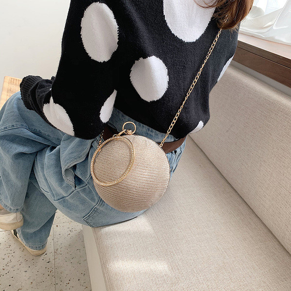 Geantă rotundă de damă cu mâner lung și închizătoare