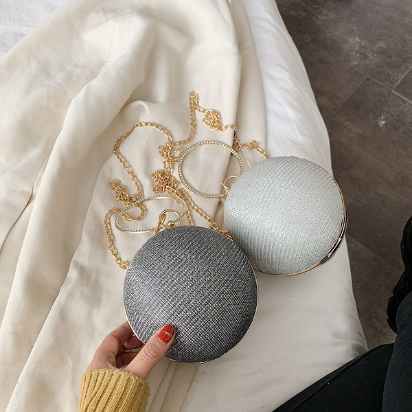 Geantă rotundă de damă cu mâner lung și închizătoare