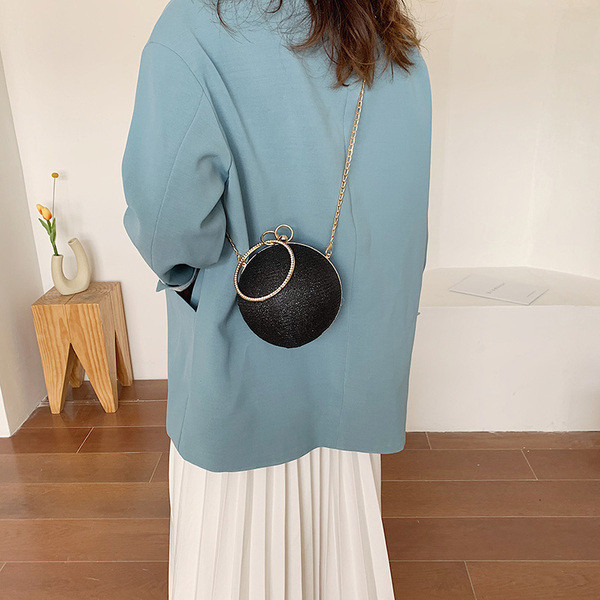 Geantă rotundă de damă cu mâner lung și închizătoare