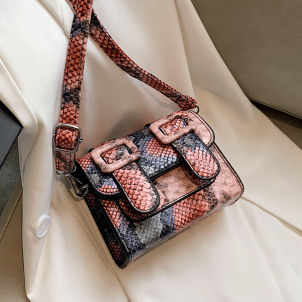 Geanta de dama moderna cu catarame