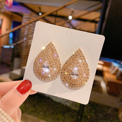 Eleganti ar akmeņiem apvilkti auskari - divi modeļi