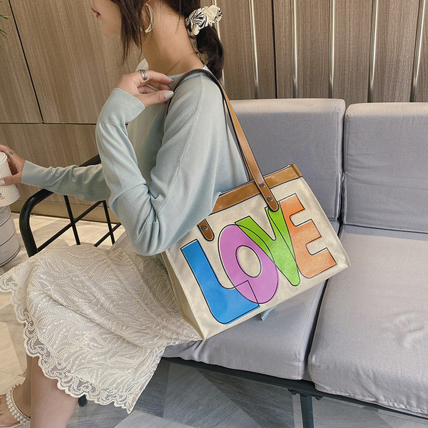 Geantă casual de damă din piele ecologică cu inscripție