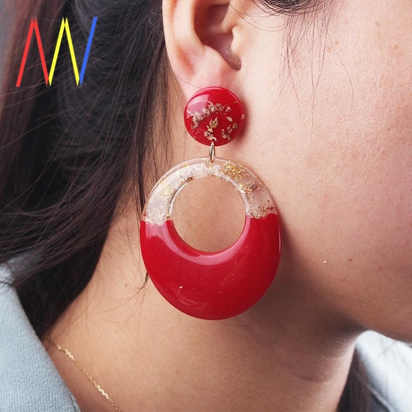 Cercei de damă moderni în două tonuri cu particule de aur