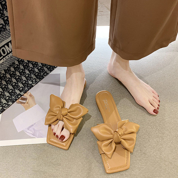 Model nou de papuci de dama din piele cu panglica