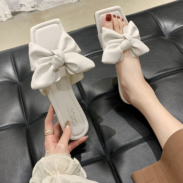 Model nou de papuci de dama din piele cu panglica