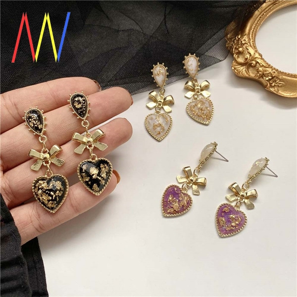 Cercei de damă vintage cu inimă și panglică