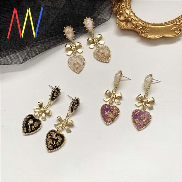 Cercei de damă vintage cu inimă și panglică