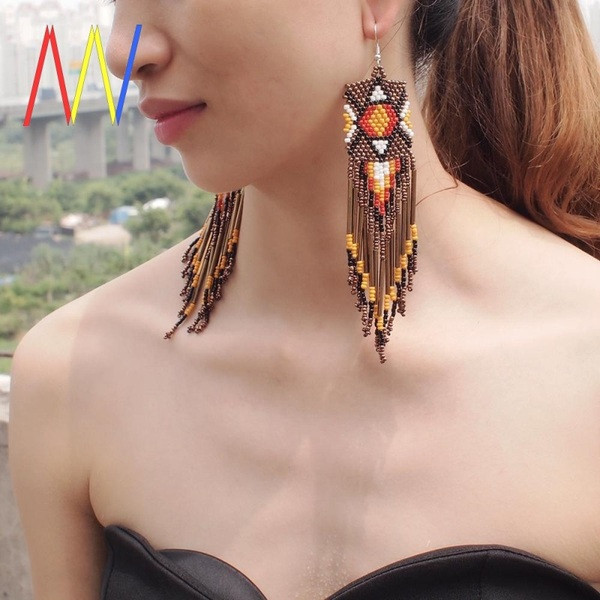 Cercei de damă atârnați cu mărgele