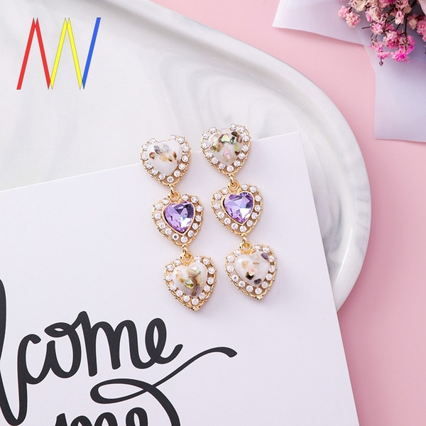 Cercei de damă suspendați în formă de inimă