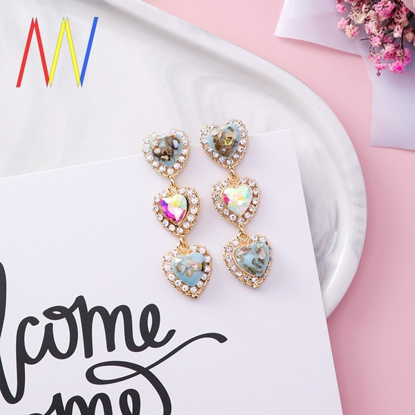 Cercei de damă suspendați în formă de inimă