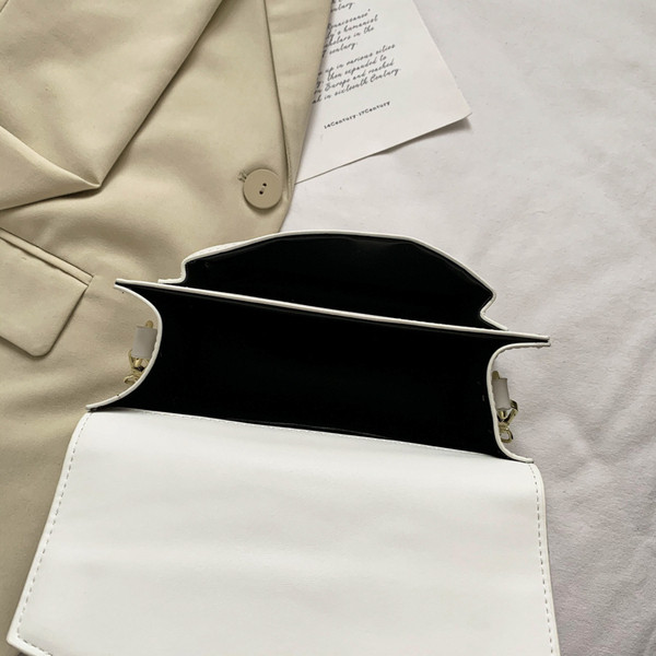 Maza kvadrātveida soma ar garu rokturi