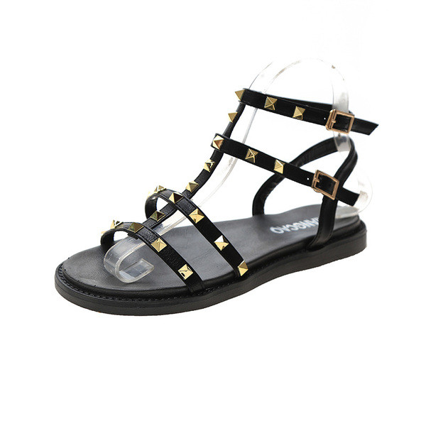 Sieviešu modernas sandales ar metāla kniedēm