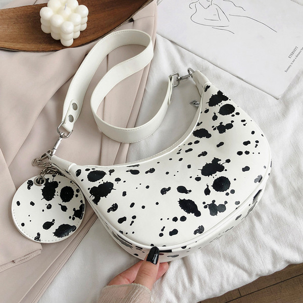 Stilīga sieviešu plecu soma apaļā formā