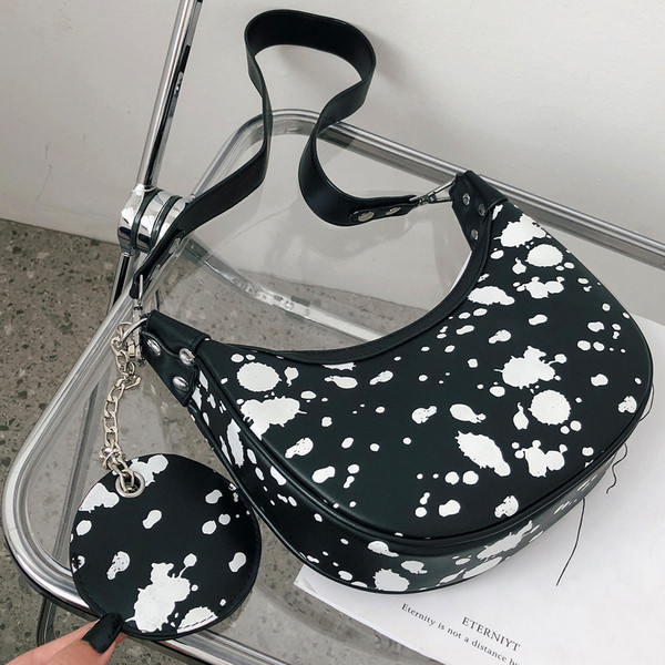 Stilīga sieviešu plecu soma apaļā formā