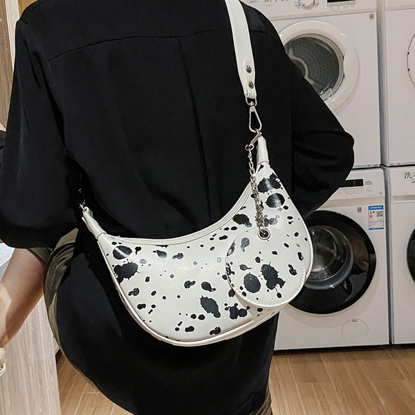 Stilīga sieviešu plecu soma apaļā formā