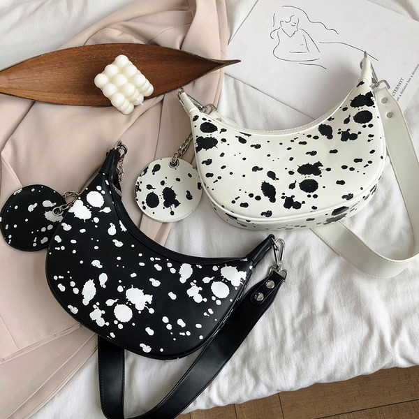 Stilīga sieviešu plecu soma apaļā formā