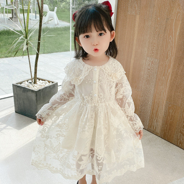 Moderna bērnu kleita ar izšuvumiem un garām piedurknēm