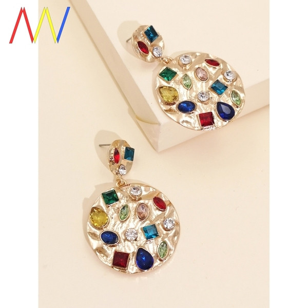 Apaļi zelta sieviešu auskari ar akmeņiem