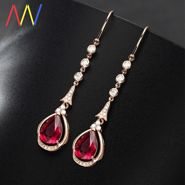 Karājoši sieviešu auskari ar rozā akmentiņu