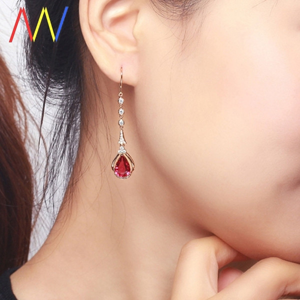 Karājoši sieviešu auskari ar rozā akmentiņu