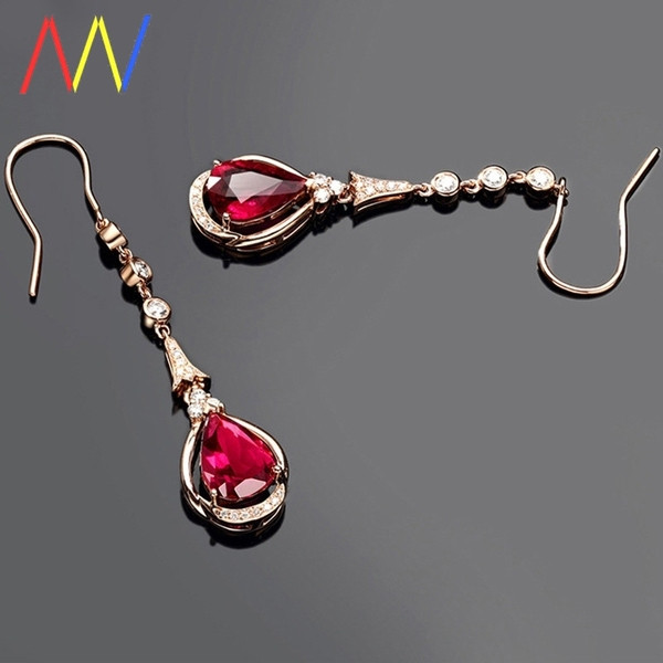 Karājoši sieviešu auskari ar rozā akmentiņu