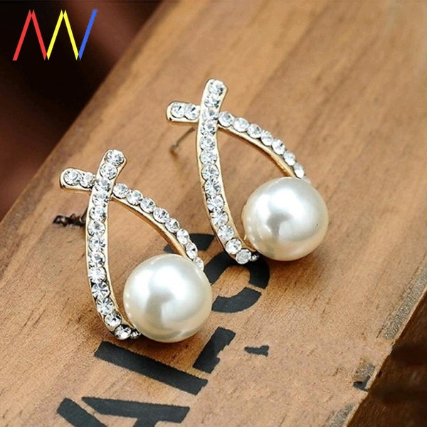 Eleganti sieviešu auskari ar akmeņiem un pērlēm