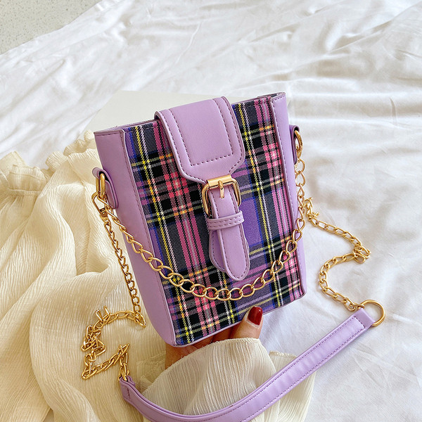 Sieviešu moderna soma ar sprādzi un garu rokturi