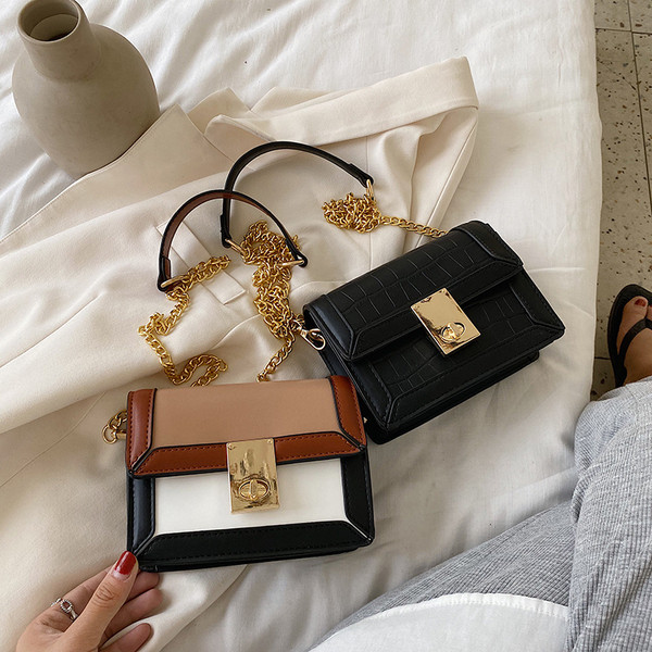 Stílusos női táska eco bőrből a vállra, csattal