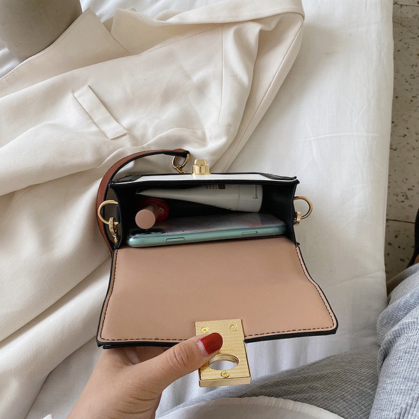 Stílusos női táska eco bőrből a vállra, csattal