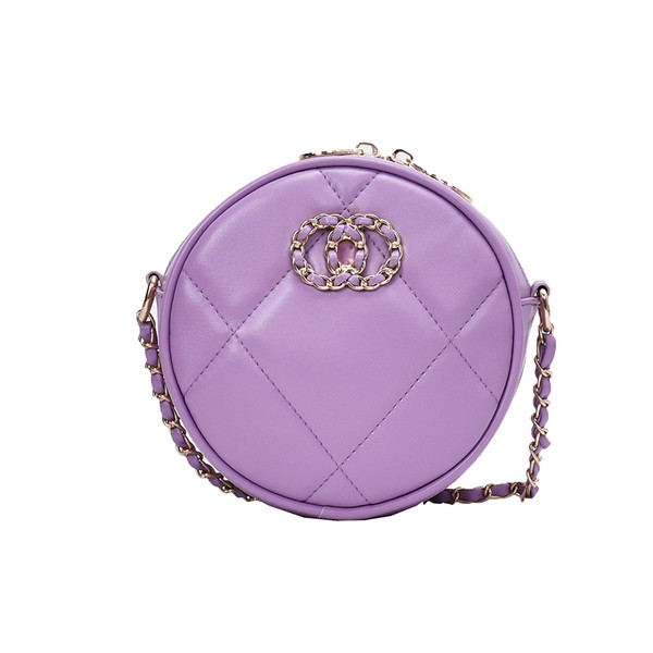 Modern női táska kerek formában, csattal