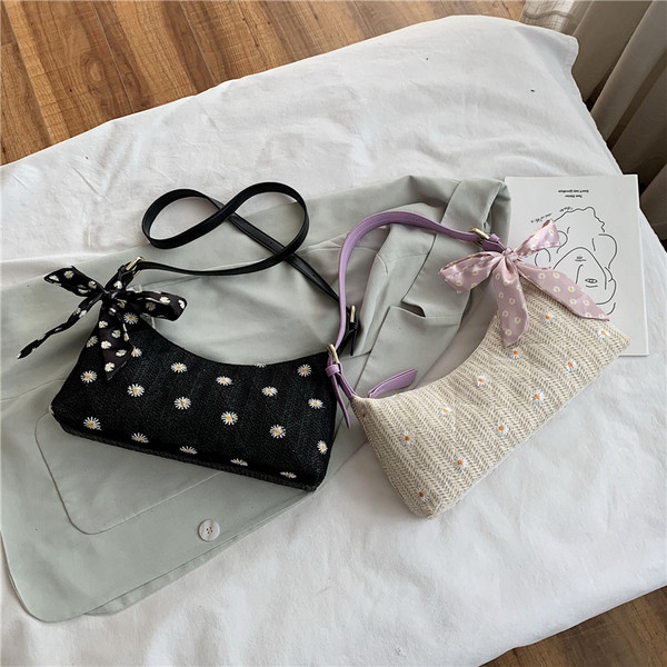 Női korszerű kötött válltáska