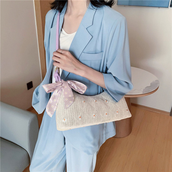 Női korszerű kötött válltáska