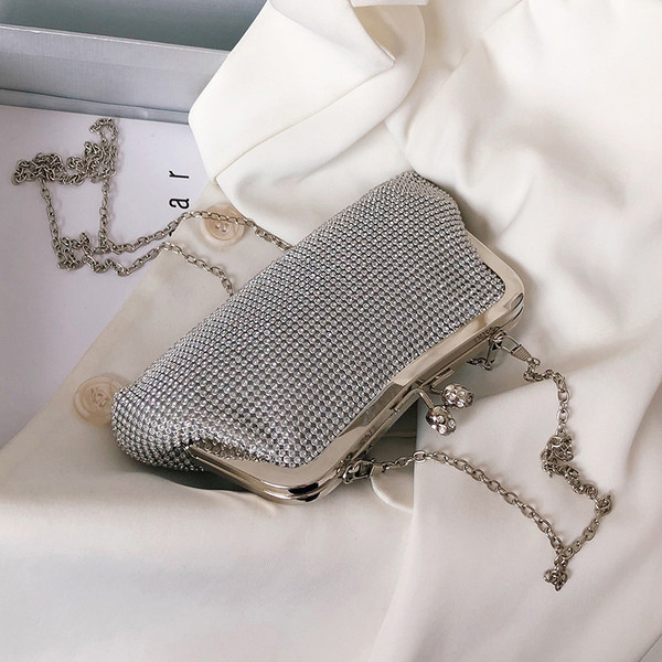 Elegáns női táska díszkövekkel