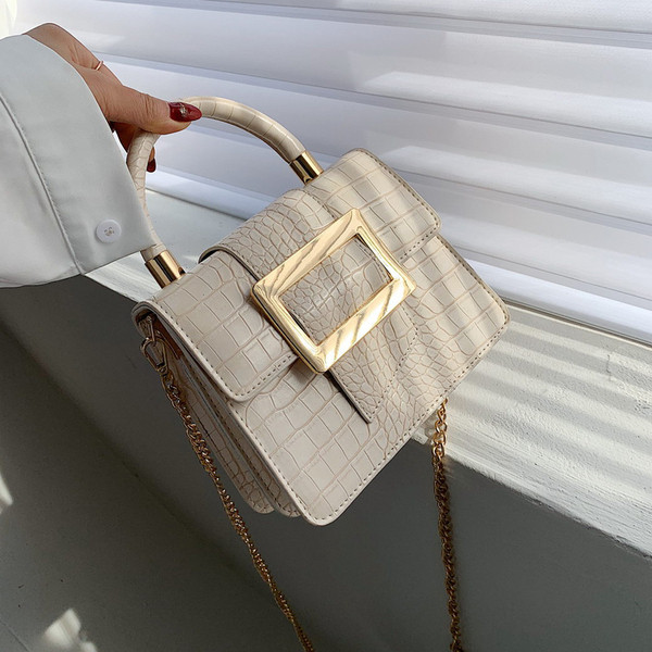 Elegáns női kis táska eco bőrből, csattal