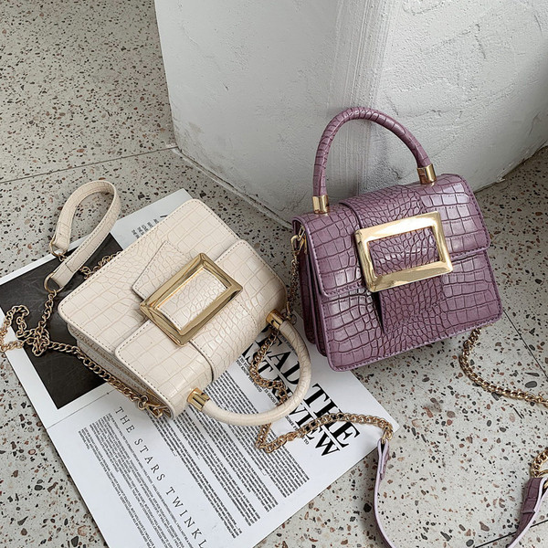 Elegáns női kis táska eco bőrből, csattal