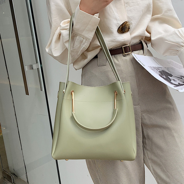 Ikdienas sieviešu somas vienkāršs modelis ar īsu un garu rokturi