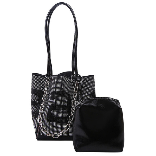 Modern női táska fém elem széles modellel