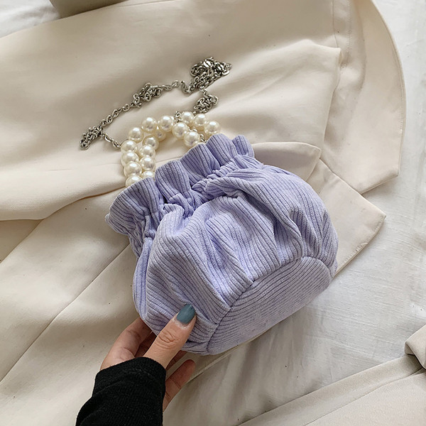 Modern női kistáska díszgyöngyökkel